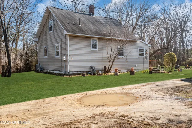 a front view of house with garden