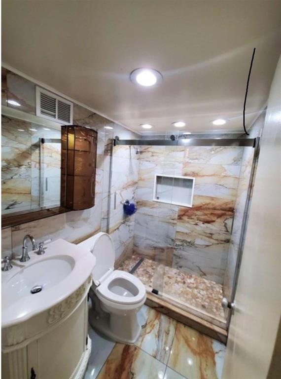 620 Peachtree Street Northeast, Unit 901 Atlanta, GA 30308 - Photo 18 of 19 a bathroom with a sink and a mirror