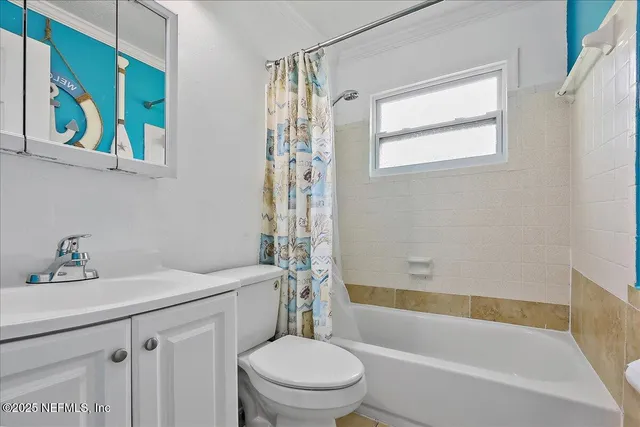 a bathroom with a sink toilet and bathtub