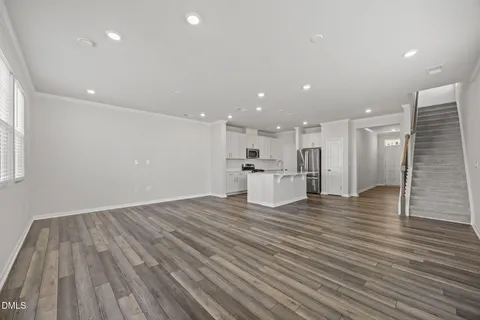 a view of kitchen with wooden floor