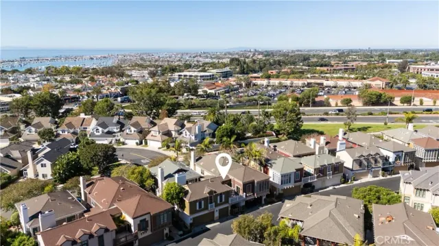 an aerial view of a city with lots of residential buildings