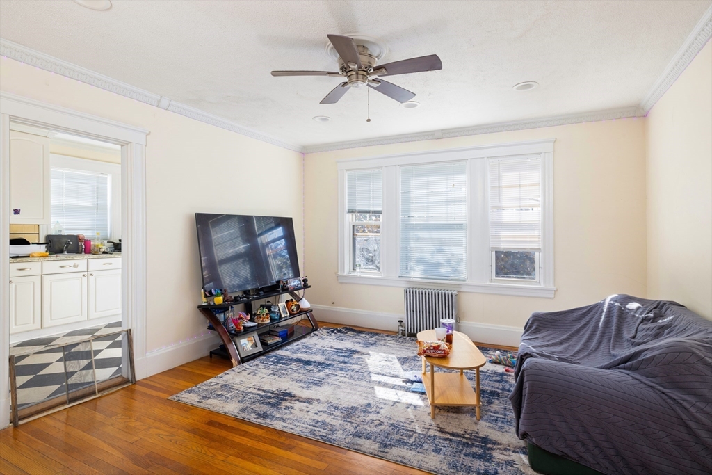 99 Franklin Street Lynn, MA 01902 - Photo 8 of 11 a living room with furniture and a window