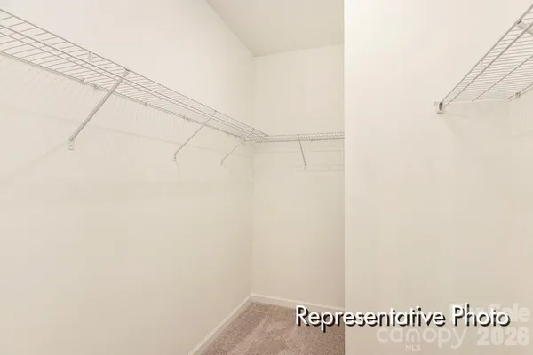 a view of a refrigerator in front of a white house