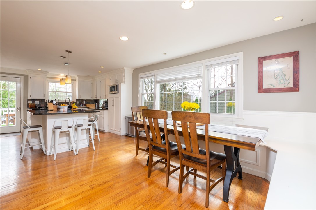 8 Curtis Road Bristol, RI 02809 - Photo 20 of 50 Table overlooks beautiful bank of windows.