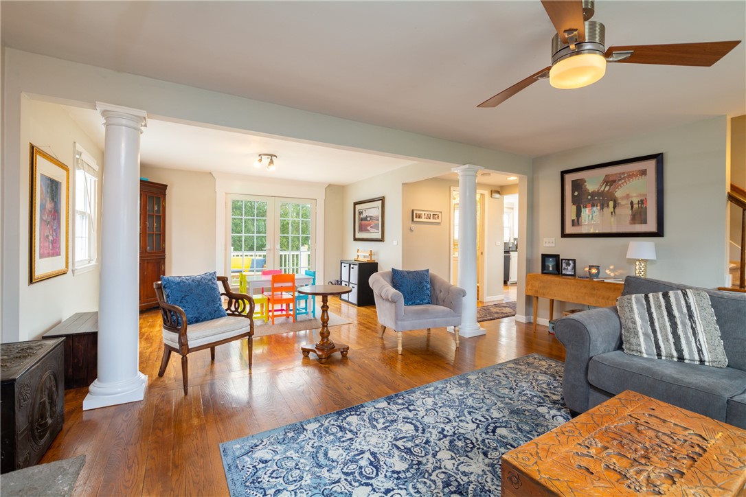 8 Curtis Road Bristol, RI 02809 - Photo 27 of 50 Living room runs front to back providing versatility with its open space.