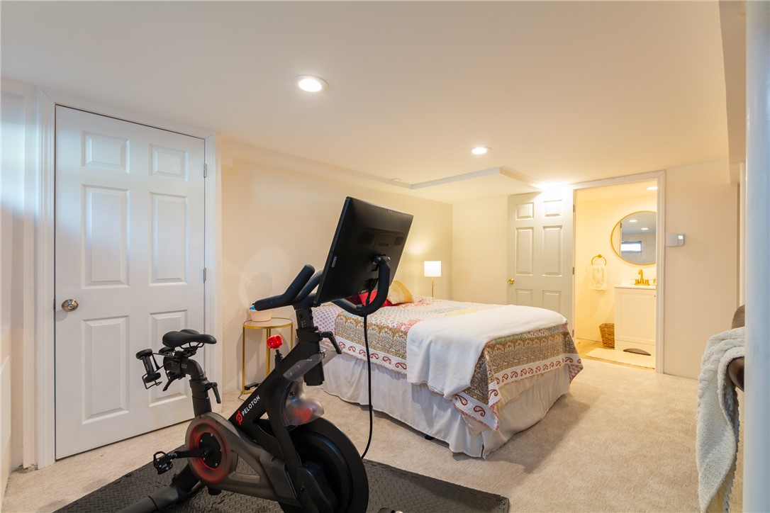 8 Curtis Road Bristol, RI 02809 - Photo 45 of 50 Finished lower level with view into half bath.