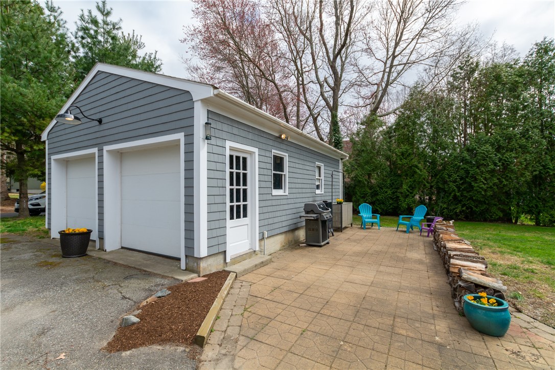 8 Curtis Road Bristol, RI 02809 - Photo 7 of 50 Side area between garage and backyard.