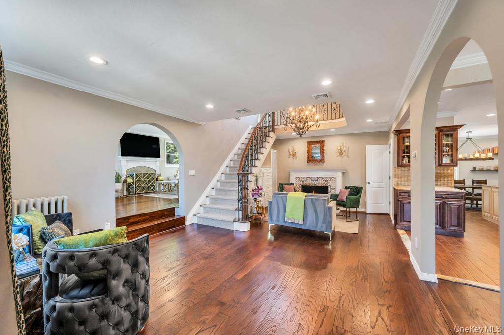 357 Wynsum Avenue Merrick, NY 11566 - Photo 5 of 40 a living room with furniture and wooden floor