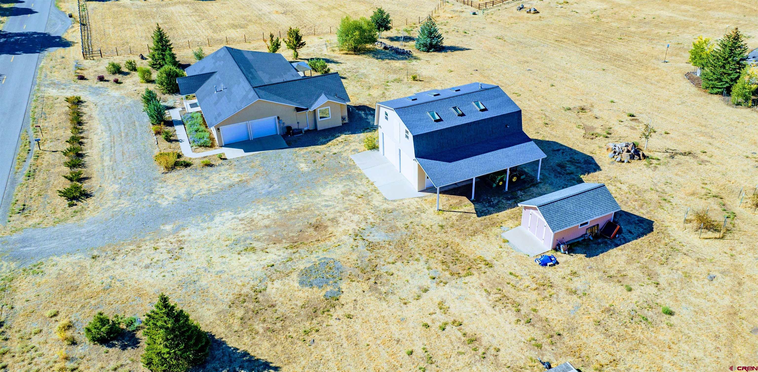 18641 2375th Road Cedaredge, CO 81413 - Photo 7 of 35 swimming pool with mountain view and wooden floor