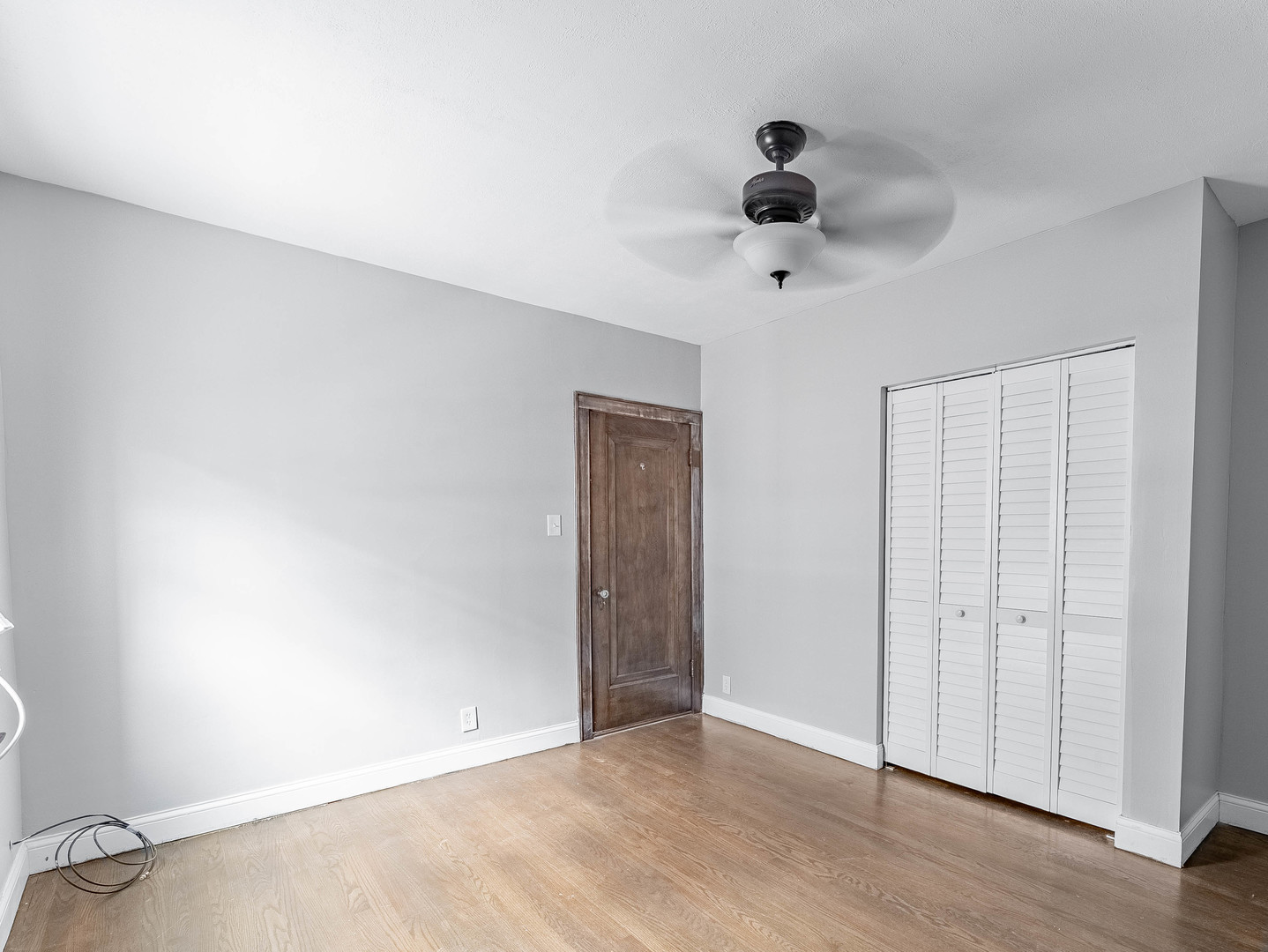 2246 Clinton Avenue Berwyn, IL 60402 - Photo 7 of 23 wooden floor in an empty room