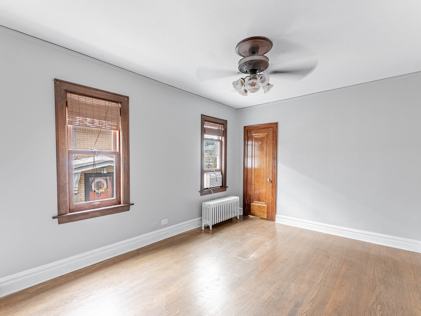 2246 Clinton Avenue Berwyn, IL 60402 - Photo 8 of 23 a view of an empty room with a window