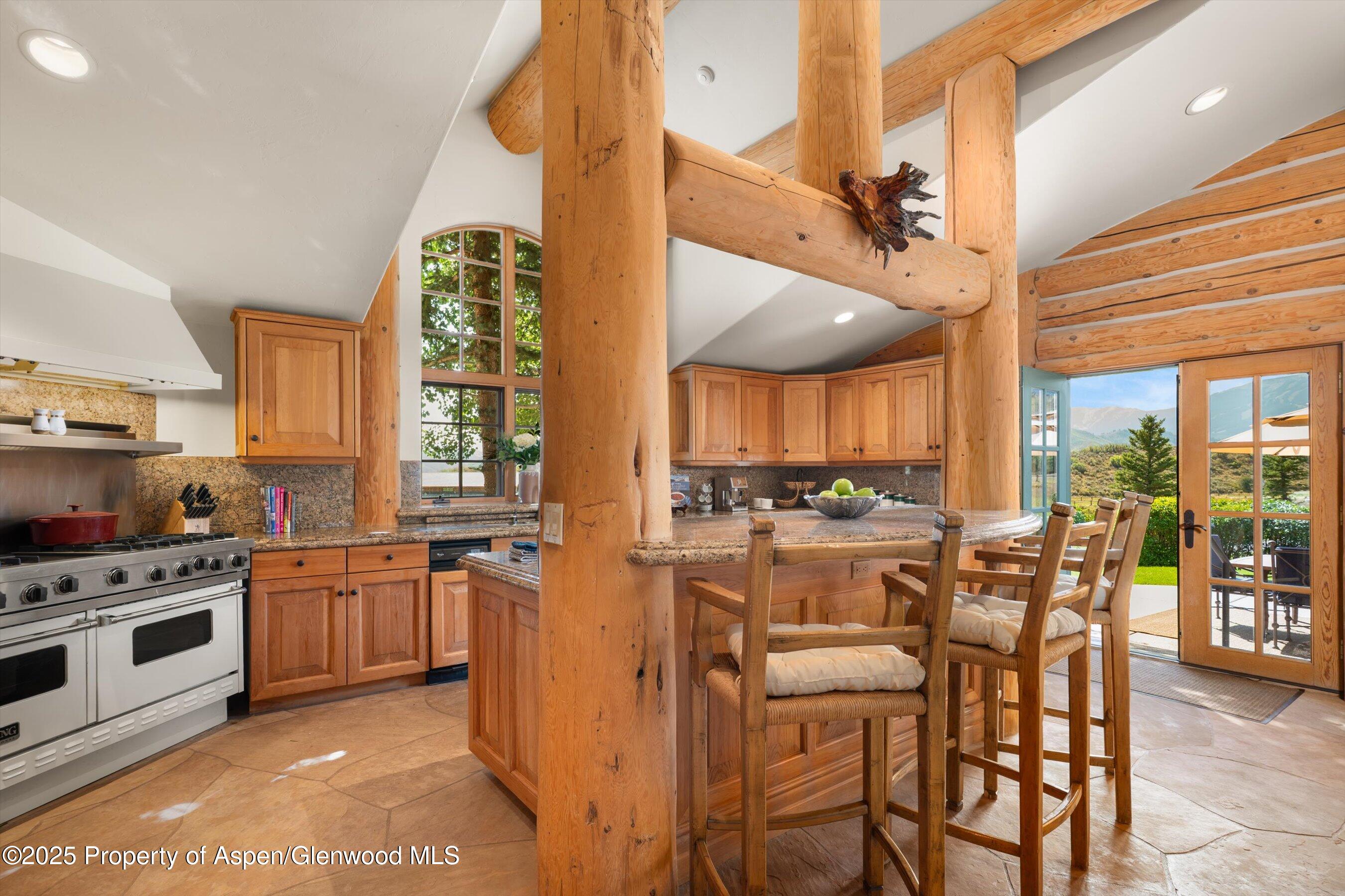 1301 Shield O Road Snowmass, CO 81654 - Photo 25 of 58 Kitchen Opens to Terrace