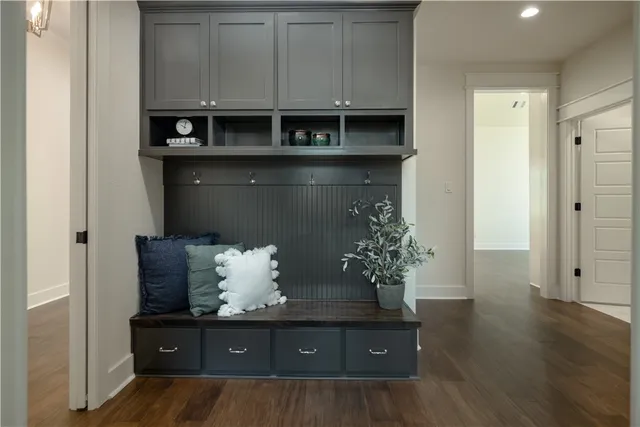 a view of an entryway with wooden floor