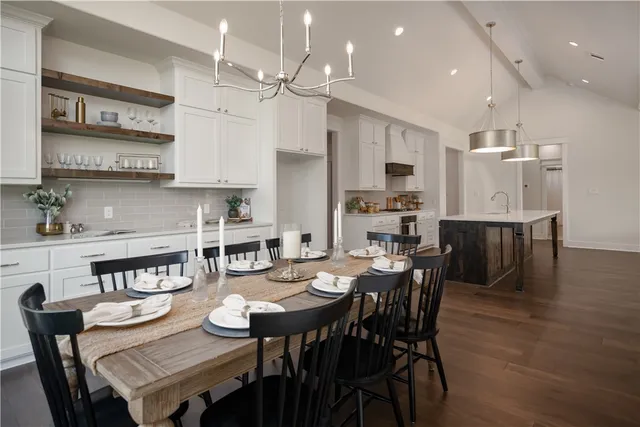 a view of kitchen with cabinets and wooden floor