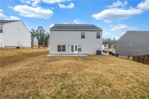 a house with trees in front of it