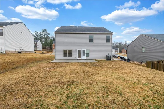 a house with trees in front of it