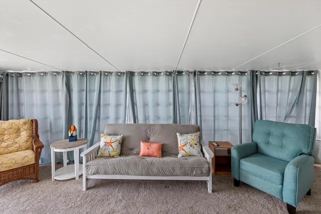 a living room with furniture and a couch