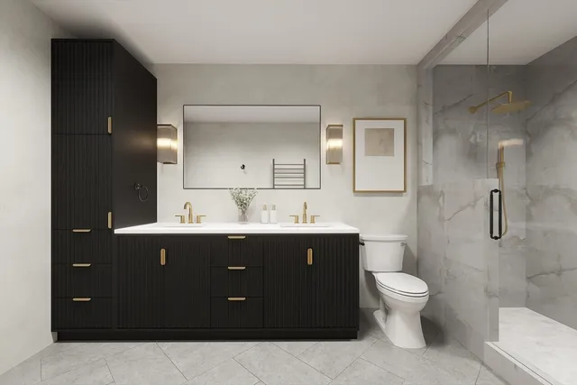 a bathroom with a sink vanity granite toilet and a mirror