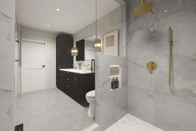 a bathroom with a double vanity sink toilet and shower