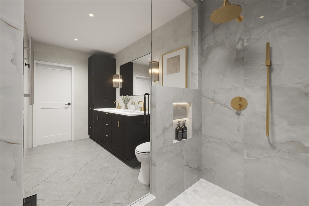 34 Governor Winthrop Road, Unit 2 Somerville, MA 02145 - Photo 15 of 23 a bathroom with a double vanity sink toilet and shower