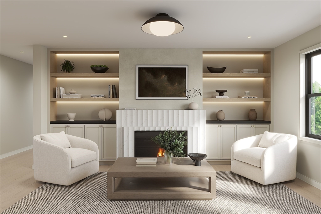 34 Governor Winthrop Road, Unit 2 Somerville, MA 02145 - Photo 8 of 23 a living room with furniture and a fireplace