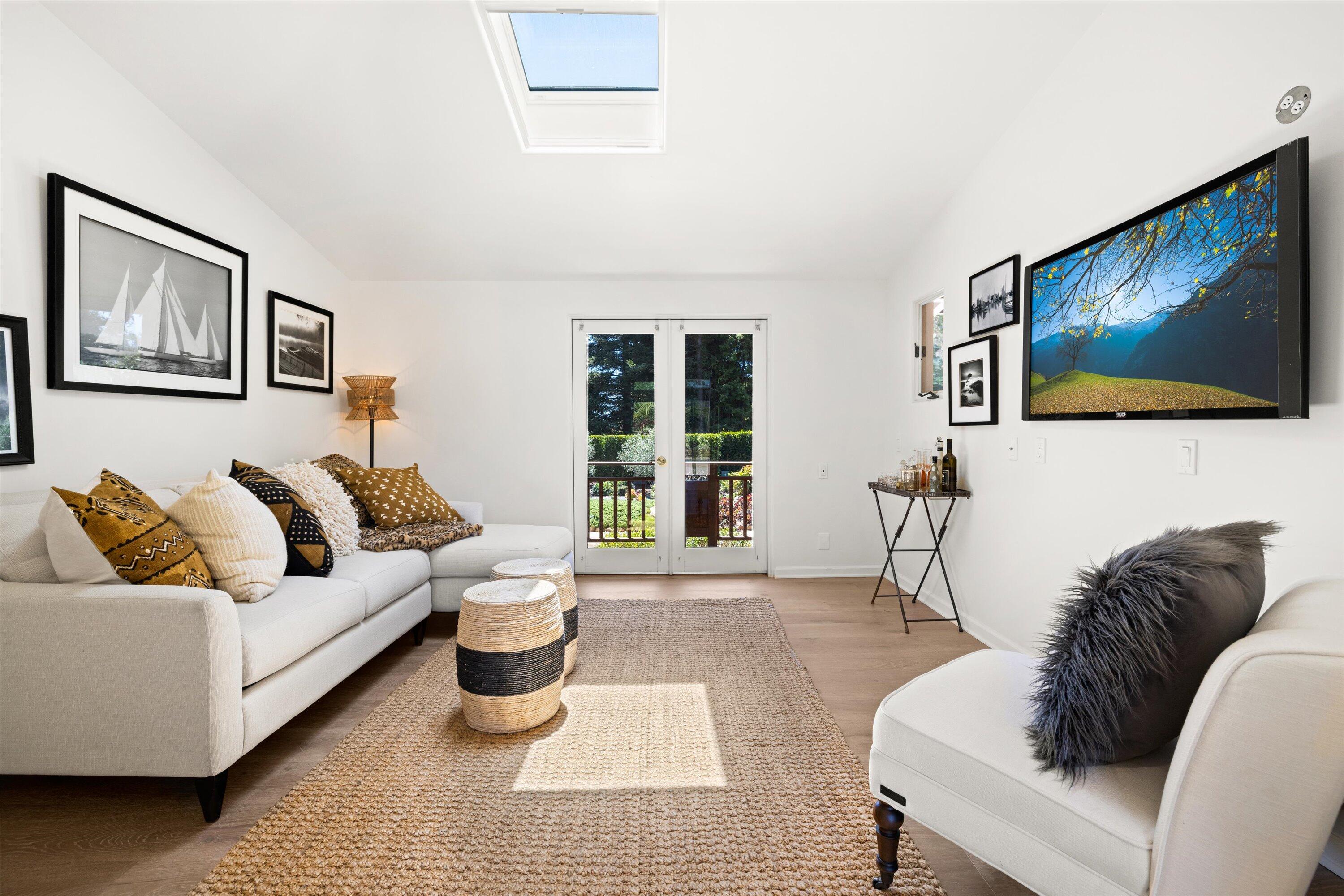 2150 10 Acre Road Montecito, CA 93108 - Photo 14 of 26 a living room with furniture and a flat screen tv