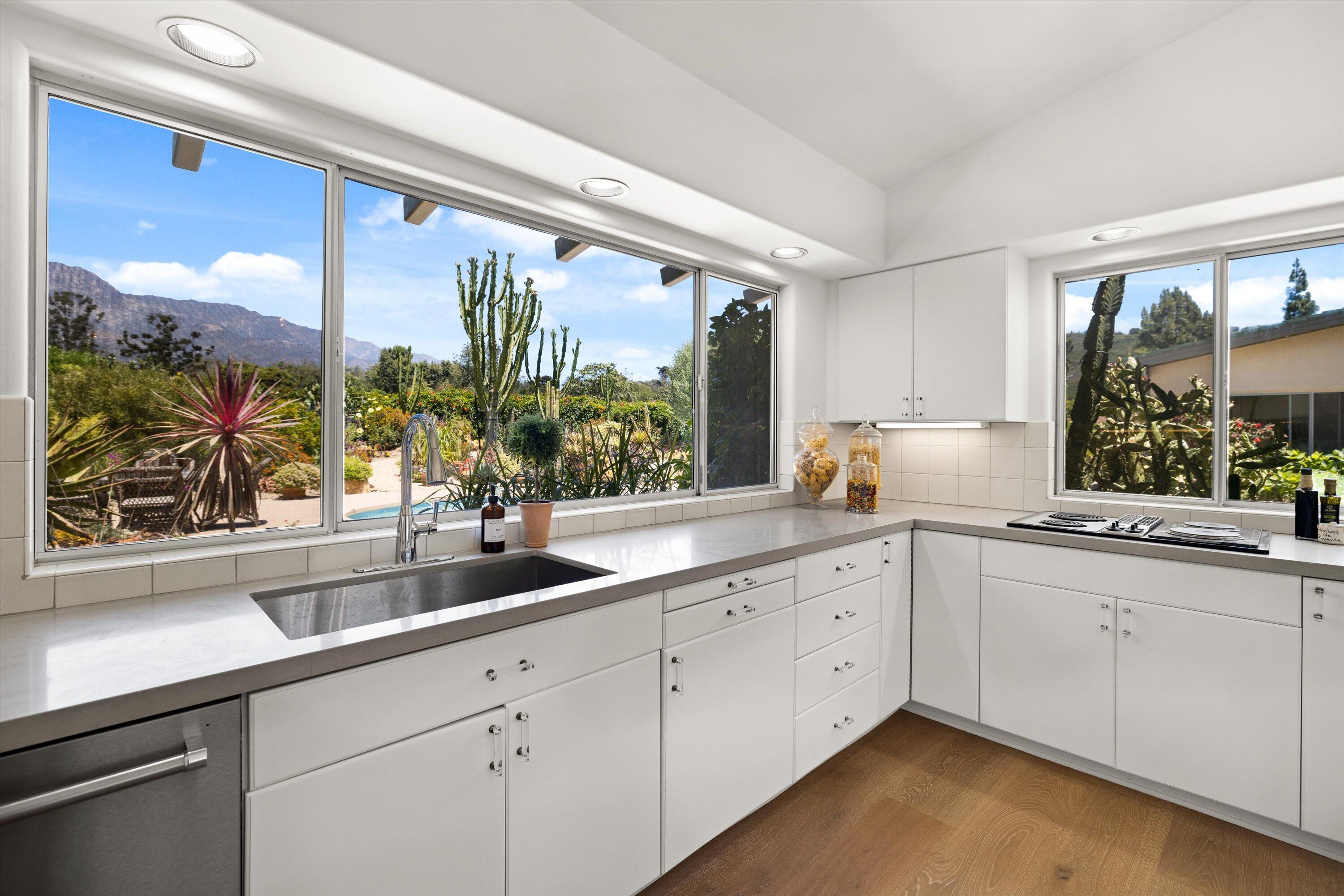 2150 10 Acre Road Montecito, CA 93108 - Photo 2 of 26 a white kitchen with sink and window