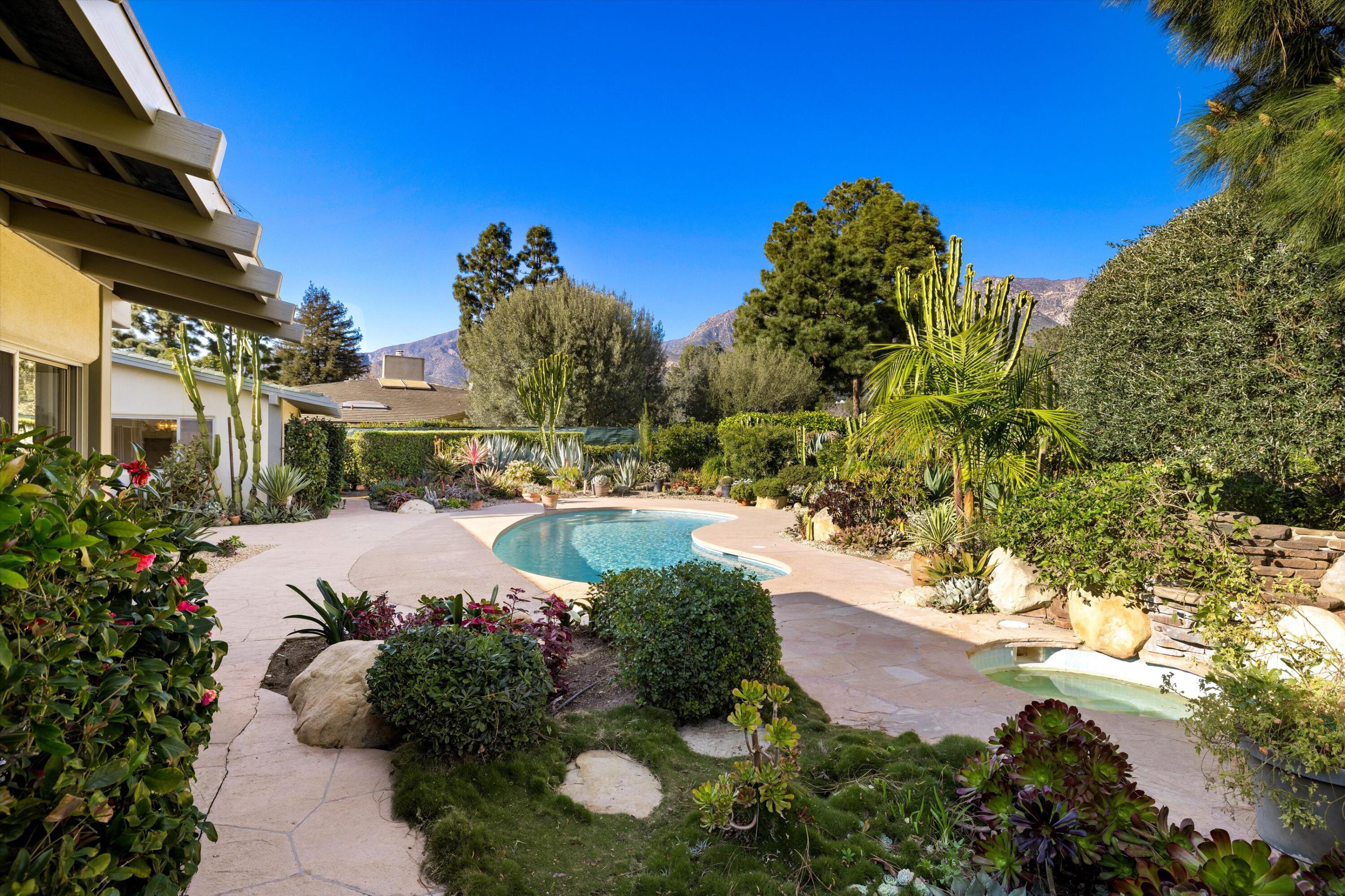 2150 10 Acre Road Montecito, CA 93108 - Photo 23 of 26 a view of a yard with plants and a fountain