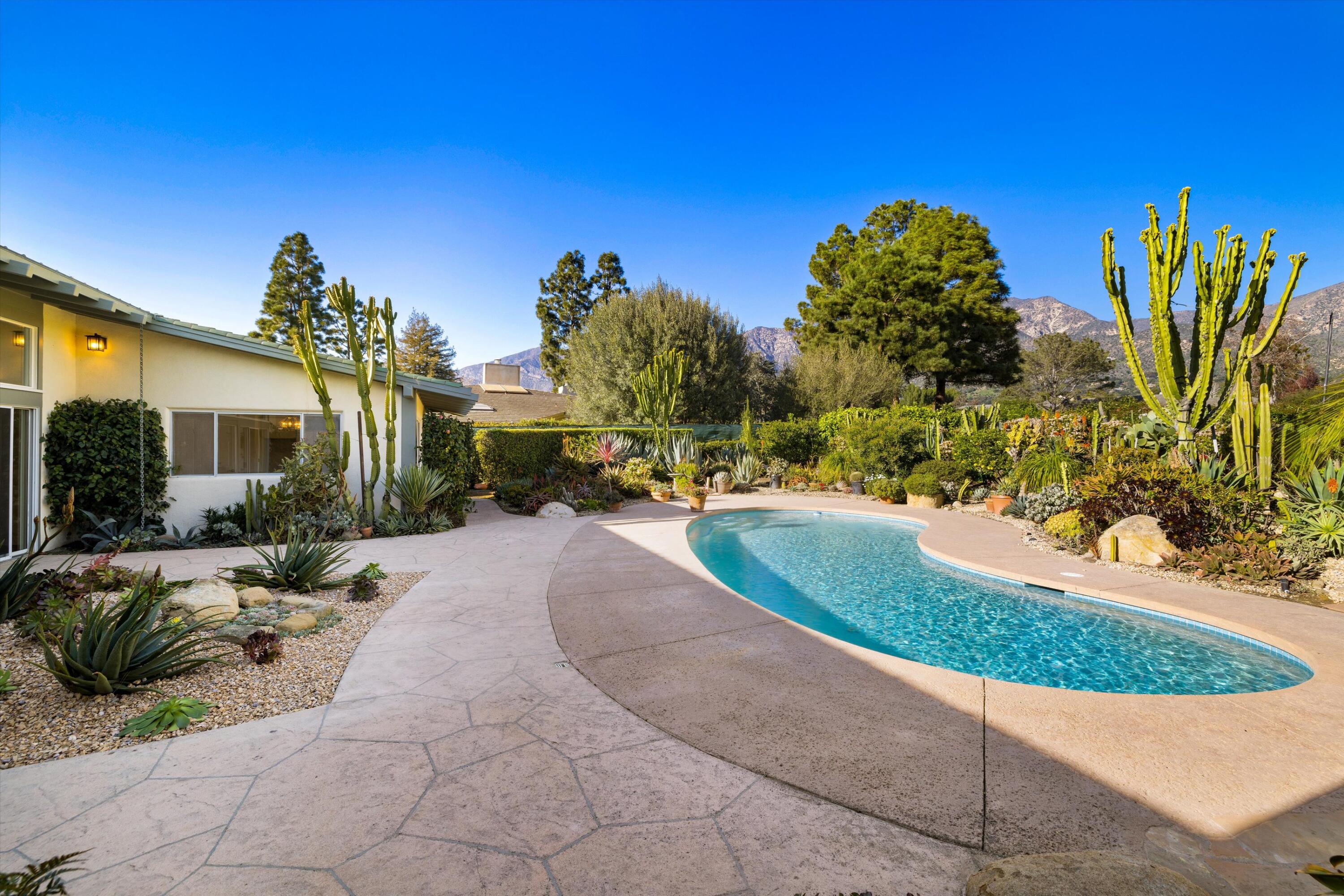 2150 10 Acre Road Montecito, CA 93108 - Photo 24 of 26 a view of a backyard with plants and a patio
