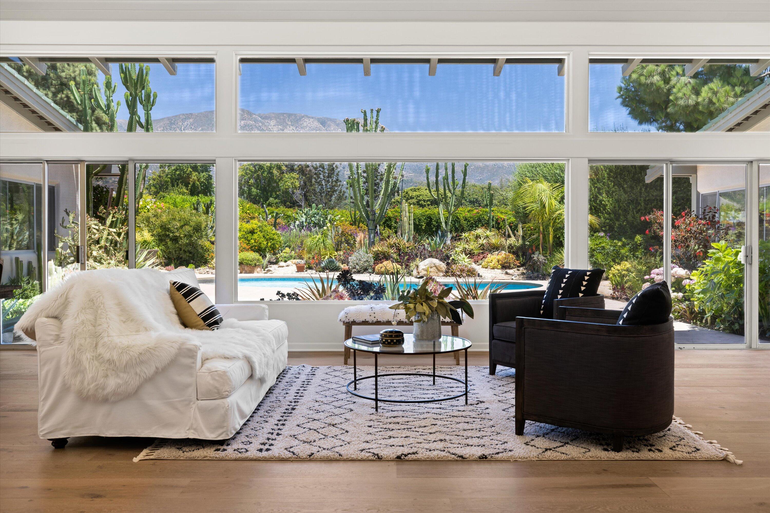 2150 10 Acre Road Montecito, CA 93108 - Photo 4 of 26 a living room with furniture and a floor to ceiling window