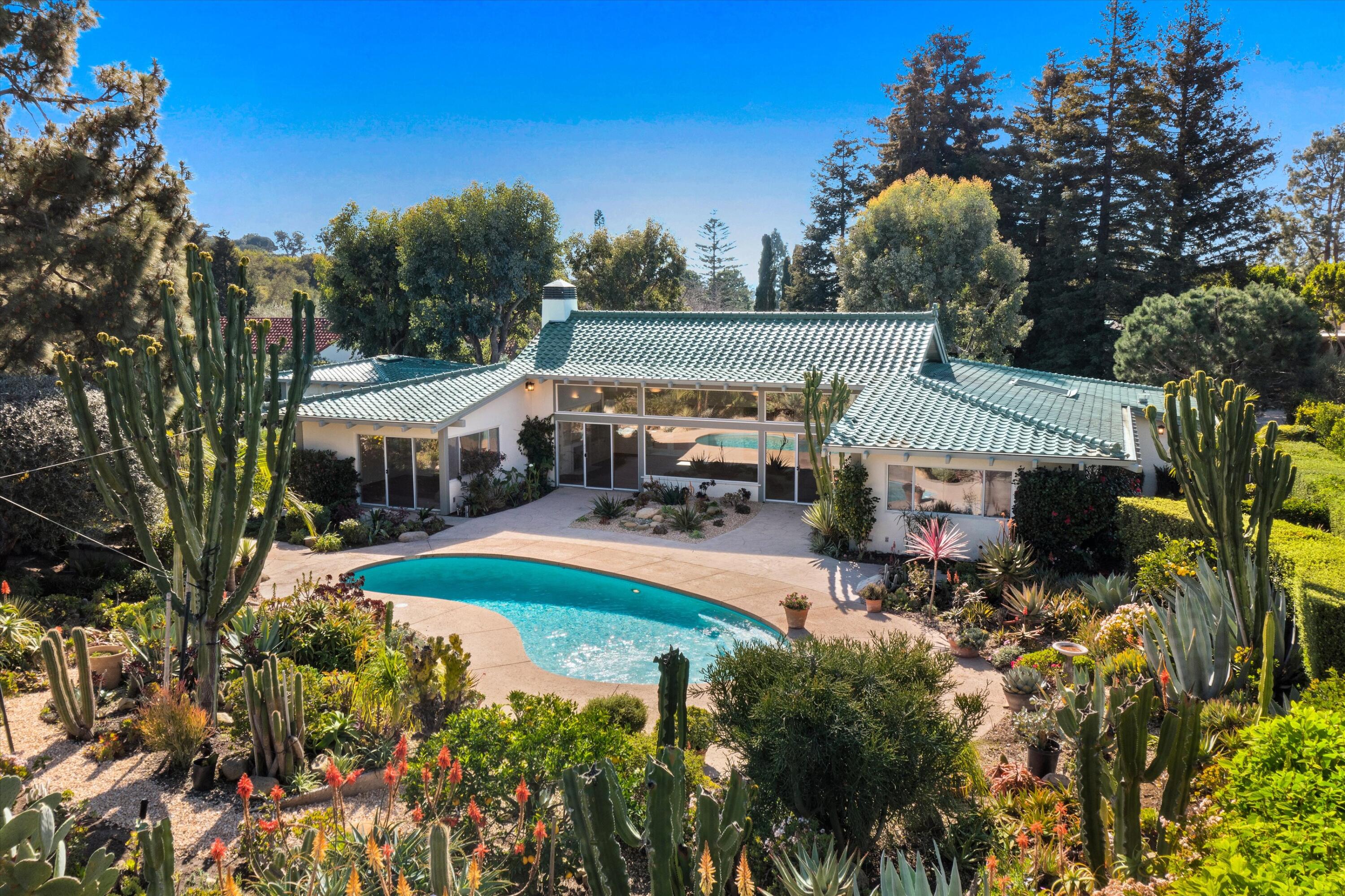 2150 10 Acre Road Montecito, CA 93108 - Photo 6 of 26 a view of a garden with houses