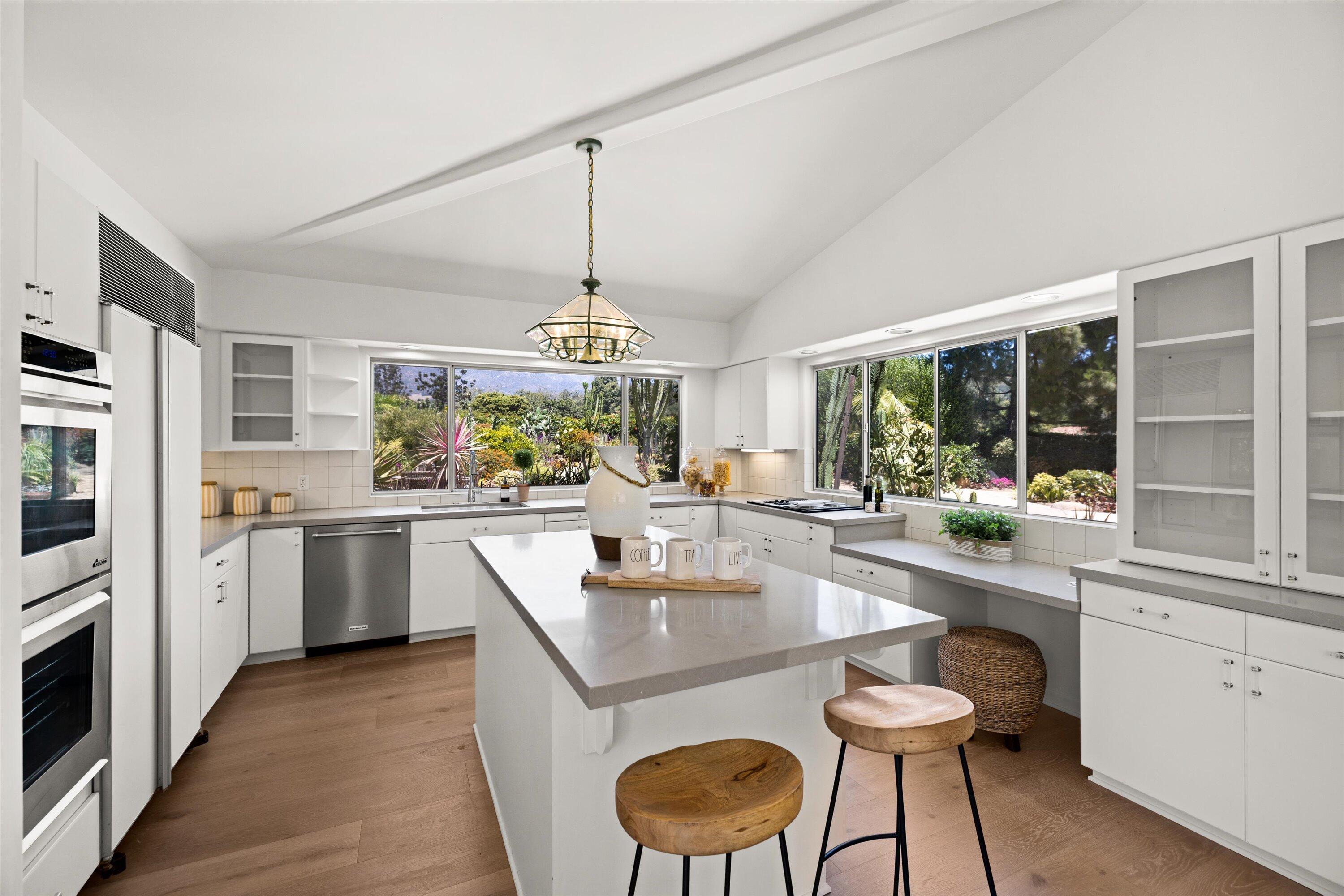 2150 10 Acre Road Montecito, CA 93108 - Photo 7 of 26 a kitchen with stainless steel appliances granite countertop a stove and refrigerator