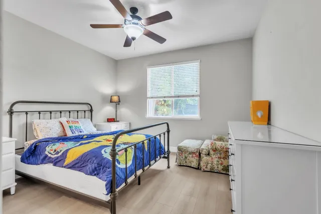 a view of living room with furniture and flat screen tv