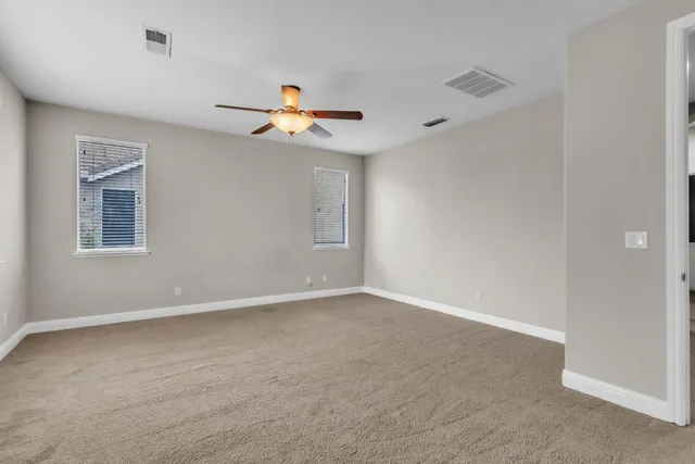 a bathroom with a bathtub a sink and a mirror
