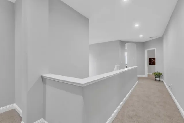 a view of a backyard with sitting area