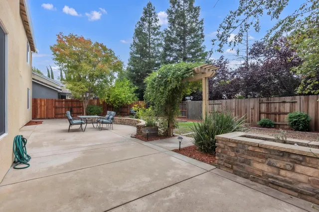 an aerial view of house with yard