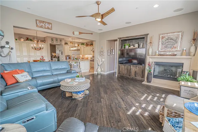 a bedroom with a large bed and a flat tv screen