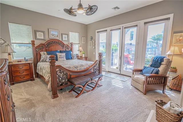 a spacious bathroom with a double vanity sink mirror and bathtub
