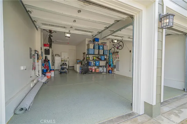 a bedroom with a bed and a lamp