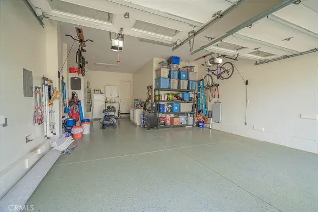 a bedroom with bed and a window