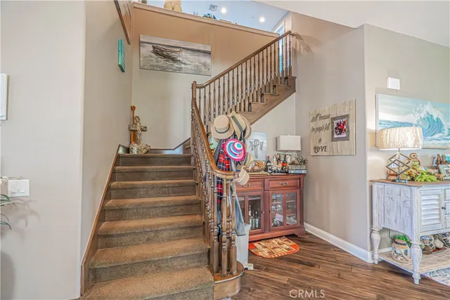 a bedroom with a bed dresser and a window