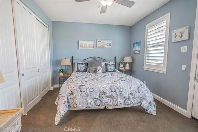 a building outdoor space with patio furniture and potted plants