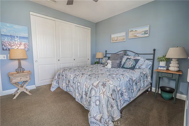 a view of a chairs and table in patio