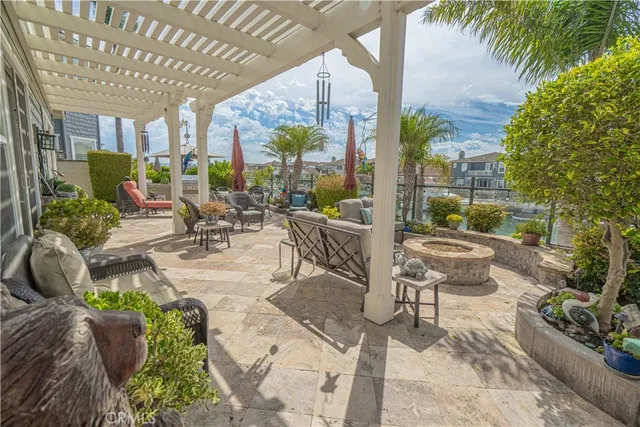 an aerial view of a city with lots of residential buildings lake and ocean view