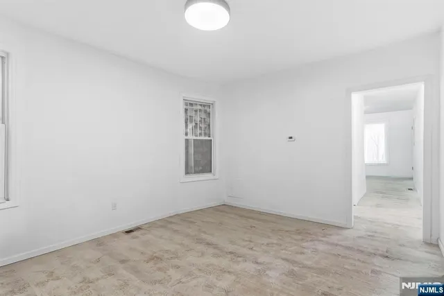 a kitchen with stainless steel appliances granite countertop a refrigerator stove a sink and a granite counter tops