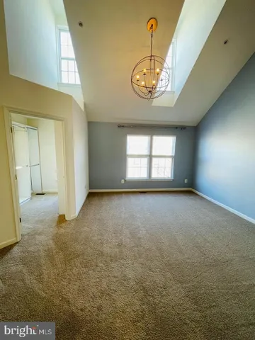 a view of room with window and stairs