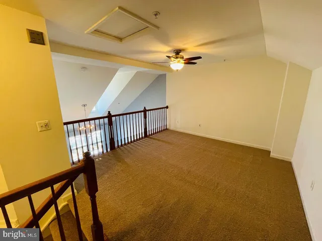 a view of a livingroom with a ceiling fan