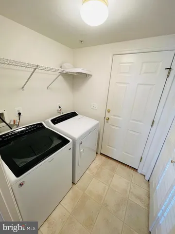 a view of a building with sitting area