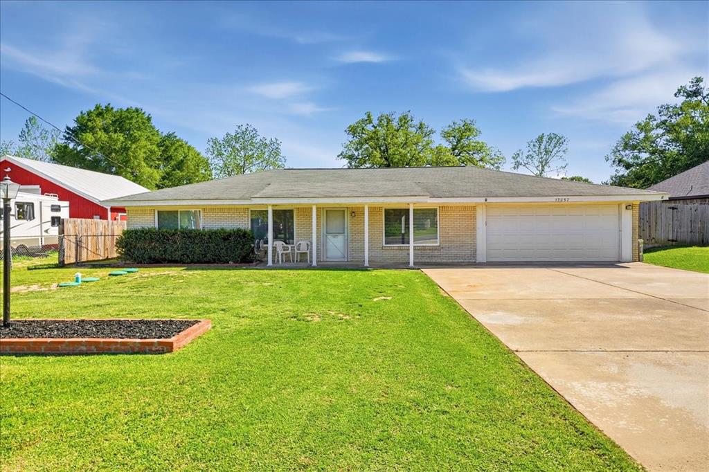 12657 Alma Street Tyler, TX 75704 - Photo 33 of 36 a view of a house with a backyard
