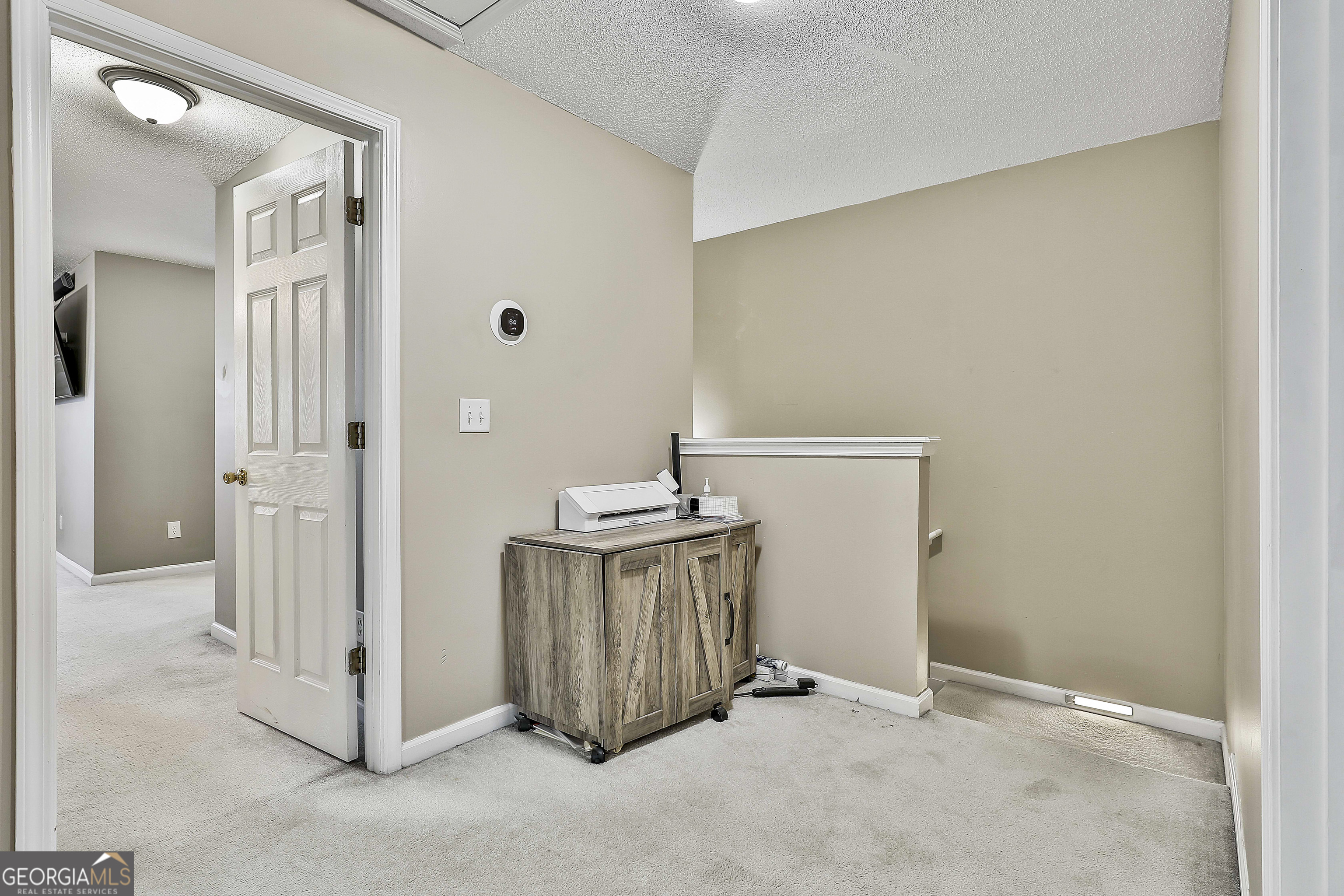 7759 Bucknell Terrace Fairburn, GA 30213 - Photo 12 of 26 a view of a hallway with closet
